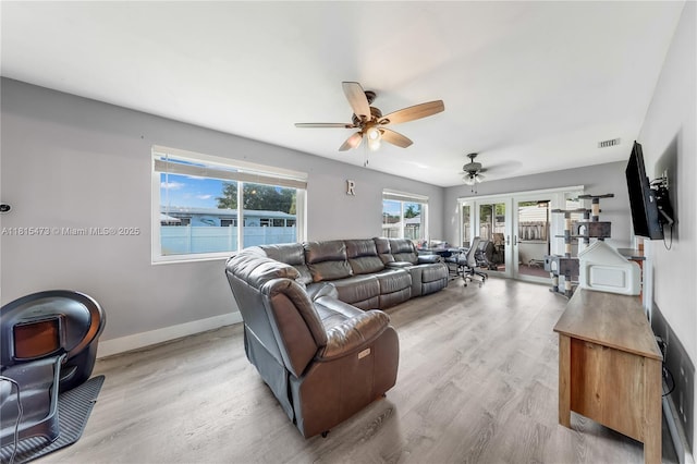 8331 NW 18th St, Pembroke Pines, FL 33024 - living room with a ceiling fan and light wood-type flooring
