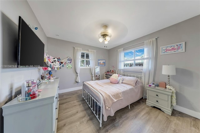 8331 NW 18th St, Pembroke Pines, FL 33024 - bedroom featuring light wood-style floors and a ceiling fan