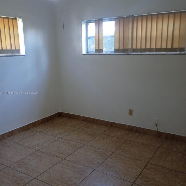 6201 SW 37th St Unit 113, Davie, FL 33314 - tiled empty room with baseboards