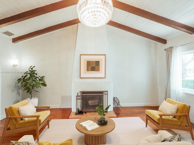 1036 Palermo Ave, Coral Gables, FL 33134 - living room with wood ceiling, a chandelier, a fireplace, and wood finished floors