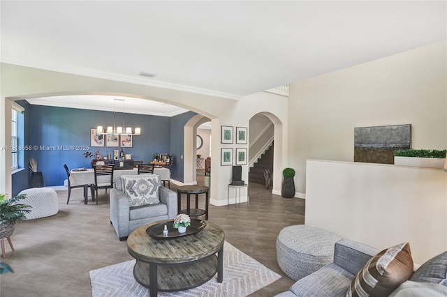 2509 Hunters Run Way, Weston, FL 33327 - living area with a chandelier, arched walkways, and crown molding