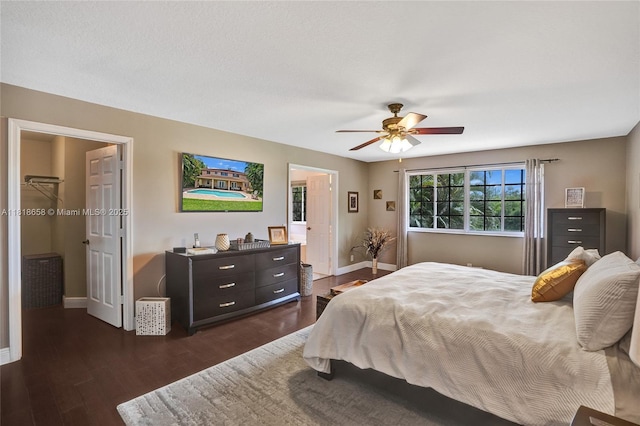 2509 Hunters Run Way, Weston, FL 33327 - bedroom featuring dark wood-style flooring and a ceiling fan