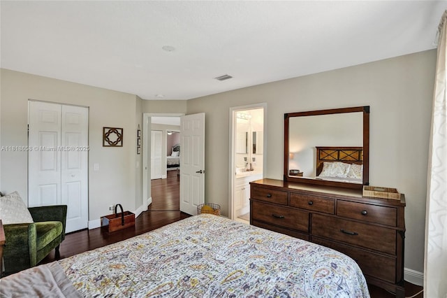 2509 Hunters Run Way, Weston, FL 33327 - bedroom featuring dark wood-type flooring, a closet, and ensuite bathroom