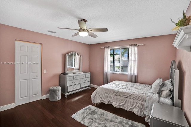 2509 Hunters Run Way, Weston, FL 33327 - bedroom with wood finished floors, a ceiling fan, and a textured ceiling