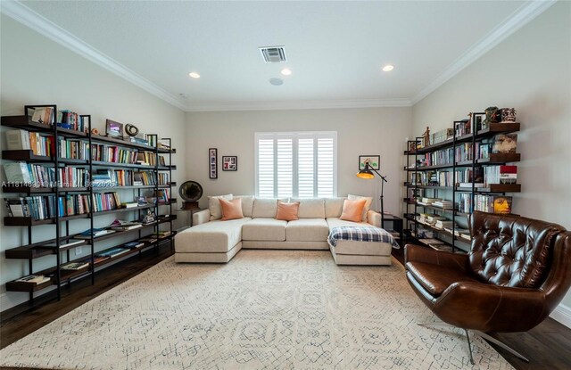 9368 Eden Roc Ct, Delray Beach, FL 33446 - living area with wood finished floors, crown molding, and recessed lighting