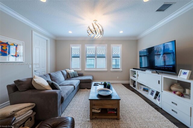 9368 Eden Roc Ct, Delray Beach, FL 33446 - living room with a chandelier, crown molding, a textured ceiling, baseboards, and recessed lighting