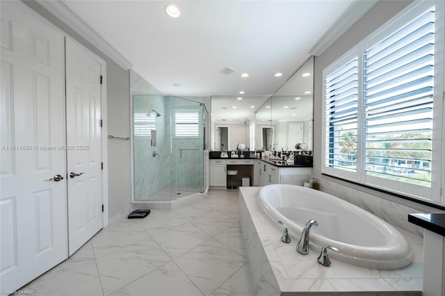 9368 Eden Roc Ct, Delray Beach, FL 33446 - full bathroom with healthy amount of natural light, vanity, a shower stall, a garden tub, and recessed lighting