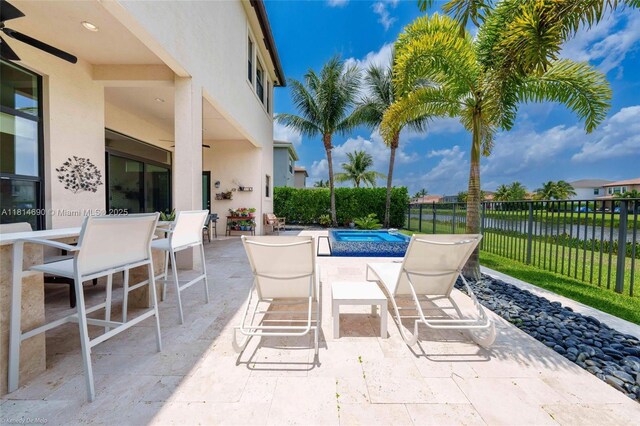 9368 Eden Roc Ct, Delray Beach, FL 33446 - view of patio featuring an in-ground hot tub
