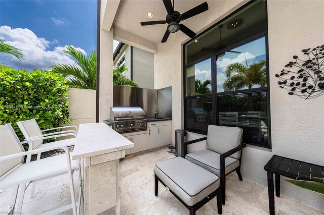 9368 Eden Roc Ct, Delray Beach, FL 33446 - view of patio with a ceiling fan and a sink