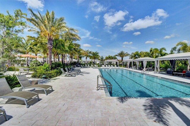 9368 Eden Roc Ct, Delray Beach, FL 33446 - community pool with a gazebo and a patio area