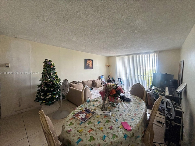 498 NW 165th St Rd Unit D-405, Miami, FL 33169 - tiled dining space featuring a textured ceiling