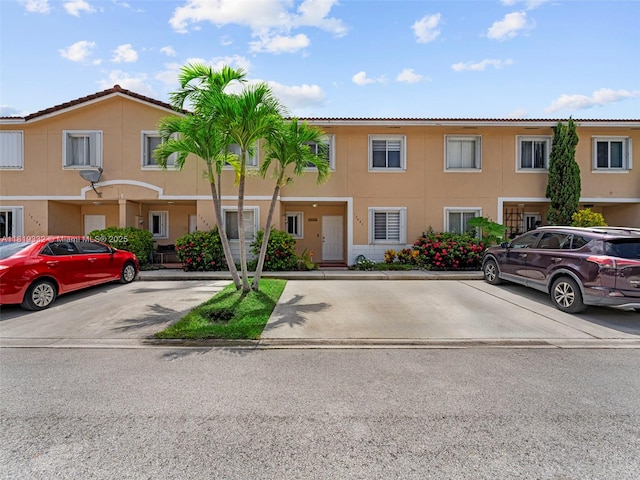 17337 SW 140th Ct, Miami, FL 33177 - townhome / multi-family property with uncovered parking and stucco siding