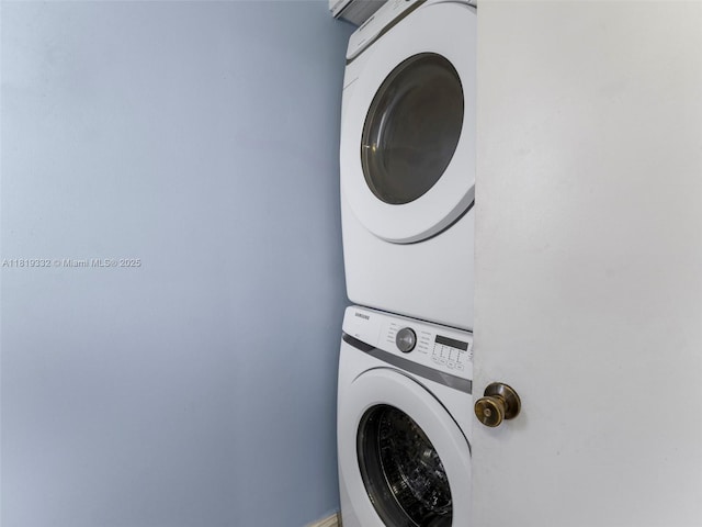 17337 SW 140th Ct, Miami, FL 33177 - laundry room featuring estacked washer and dryer