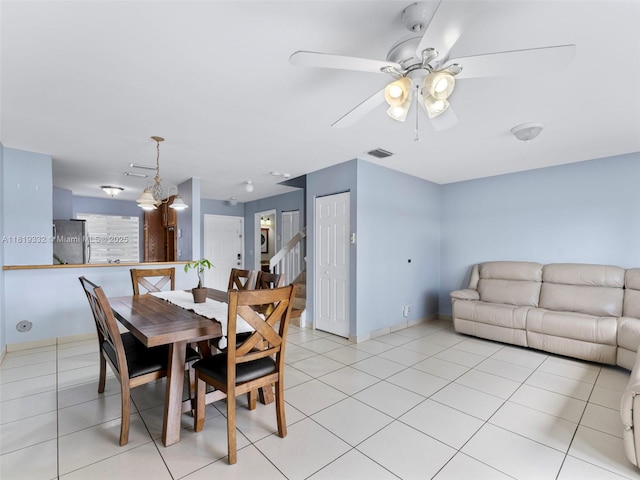 17337 SW 140th Ct, Miami, FL 33177 - dining room with a ceiling fan, light tile patterned flooring, baseboards, and stairs