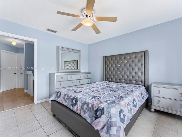 17337 SW 140th Ct, Miami, FL 33177 - bedroom with light tile patterned flooring, a ceiling fan, and baseboards