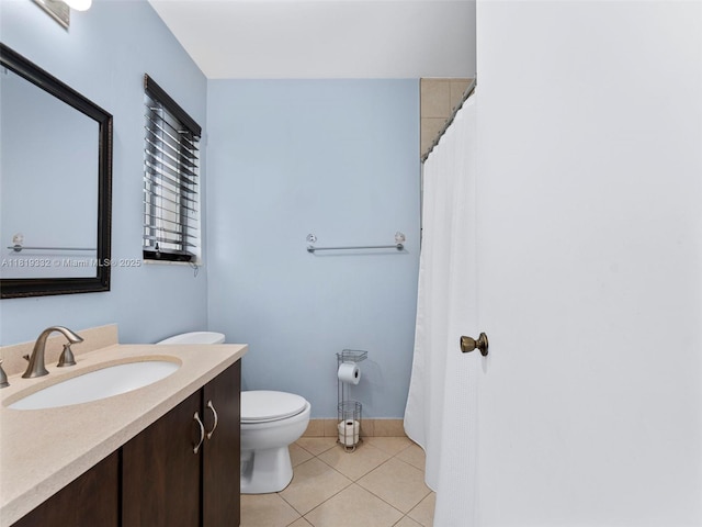 17337 SW 140th Ct, Miami, FL 33177 - full bath with toilet, vanity, tile patterned floors, baseboards, and a shower with shower curtain