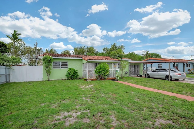 1150 W 69th Pl, Hialeah, FL 33014 - view of front facade featuring a tile roof