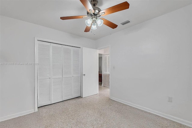 1150 W 69th Pl, Hialeah, FL 33014 - unfurnished bedroom with baseboards, a closet, and ceiling fan