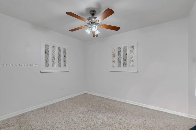1150 W 69th Pl, Hialeah, FL 33014 - spare room with ceiling fan and baseboards