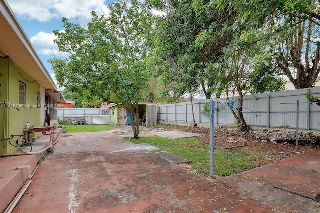 1150 W 69th Pl, Hialeah, FL 33014 - fenced backyard with a patio