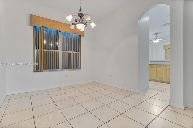 13148 SW 23rd St, Miramar, FL 33027 - empty room featuring arched walkways, a chandelier, light tile patterned floors, and ceiling fan