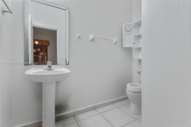 13148 SW 23rd St, Miramar, FL 33027 - bathroom featuring tile patterned flooring and a textured wall