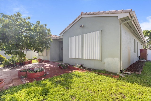 13148 SW 23rd St, Miramar, FL 33027 - rear view of house featuring a patio and stucco siding