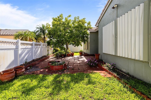 13148 SW 23rd St, Miramar, FL 33027 - fenced backyard with a patio area