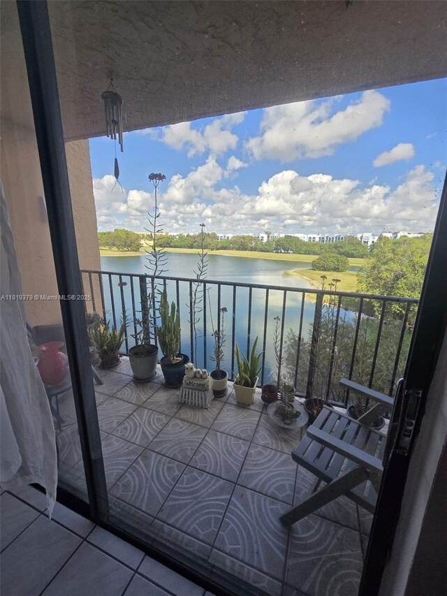 9688 Fontainebleau Blvd Unit 409, Miami, FL 33172 - balcony featuring a water view