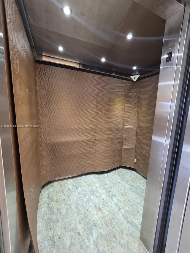 9688 Fontainebleau Blvd Unit 409, Miami, FL 33172 - elevator featuring recessed lighting