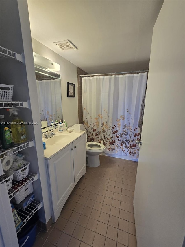 9688 Fontainebleau Blvd Unit 409, Miami, FL 33172 - bathroom with tile patterned flooring, vanity, and toilet