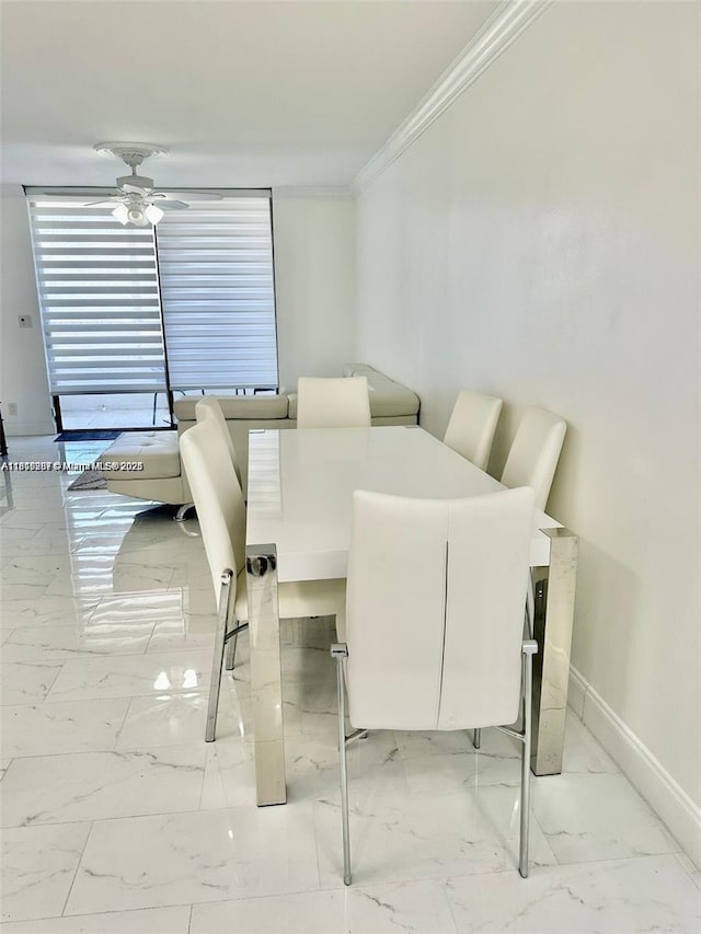 600 Three Islands Blvd Unit 703, Hallandale Beach, FL 33009 - dining area with ornamental molding, light marble finish floors, baseboards, and ceiling fan