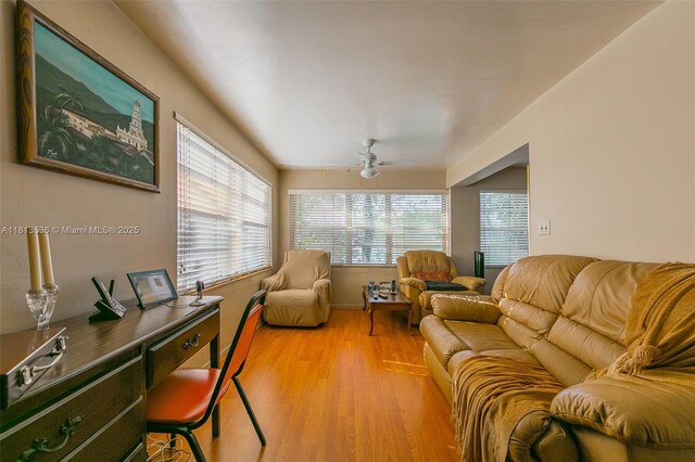 7280 SW 9th St, Miami, FL 33144 - living room featuring light wood-style flooring, ceiling fan, and a desk