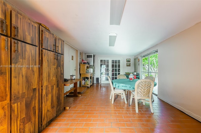 7280 SW 9th St, Miami, FL 33144 - dining room featuring french doors and baseboards