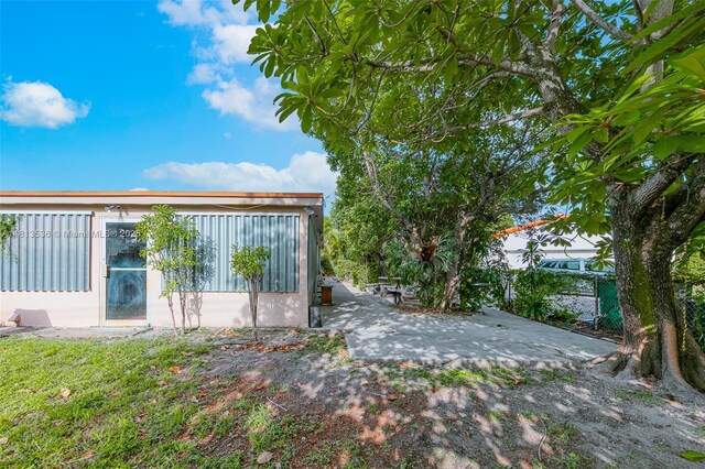 7280 SW 9th St, Miami, FL 33144 - view of yard featuring a patio area