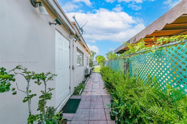 7280 SW 9th St, Miami, FL 33144 - view of side of property with stucco siding