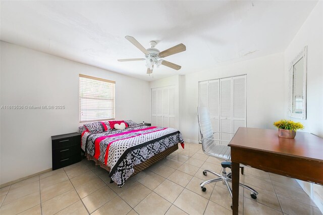 7280 SW 9th St, Miami, FL 33144 - bedroom with light tile patterned floors, baseboards, and ceiling fan