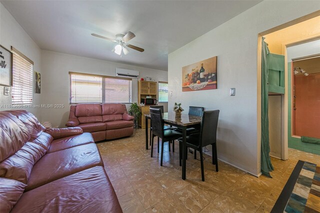 7280 SW 9th St, Miami, FL 33144 - dining space with an AC wall unit, plenty of natural light, a ceiling fan, and baseboards