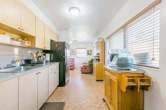 7280 SW 9th St, Miami, FL 33144 - kitchen featuring a sink, light countertops, open shelves, and decorative backsplash