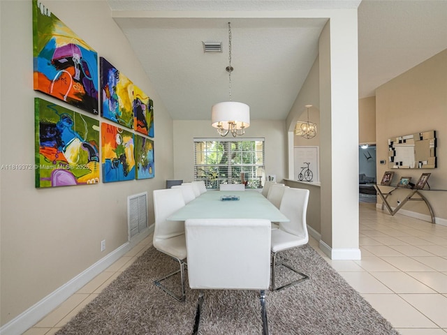 643 Lake Blvd, Weston, FL 33326 - dining room featuring a chandelier, light tile patterned flooring, baseboards, and vaulted ceiling
