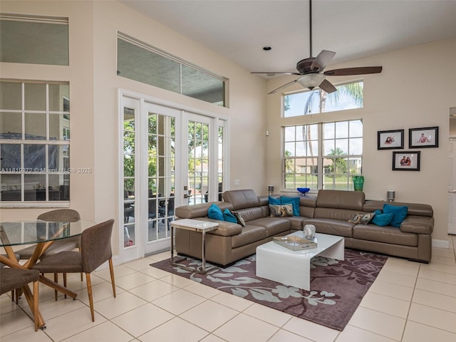 643 Lake Blvd, Weston, FL 33326 - living area featuring a high ceiling, light tile patterned flooring, plenty of natural light, and ceiling fan