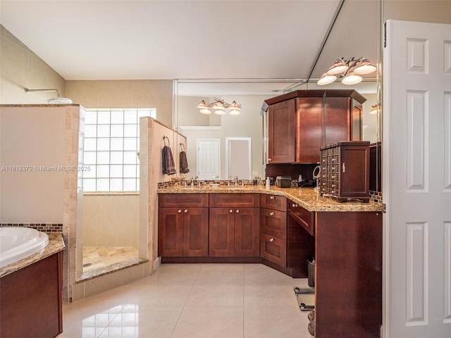 643 Lake Blvd, Weston, FL 33326 - bathroom with walk in shower, tile patterned flooring, a garden tub, and vanity