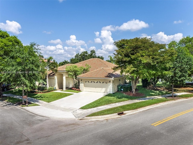 643 Lake Blvd, Weston, FL 33326 - mediterranean / spanish-style home with stucco siding, a front lawn, a garage, and concrete driveway