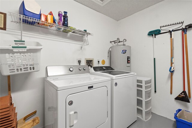 7182 Burgess Dr, Lake Worth, FL 33467 - laundry area featuring electric water heater and washing machine and dryer