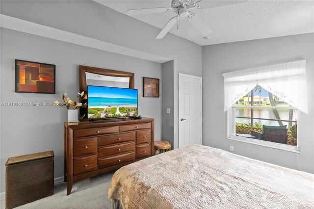 7182 Burgess Dr, Lake Worth, FL 33467 - carpeted bedroom featuring ceiling fan and a textured ceiling