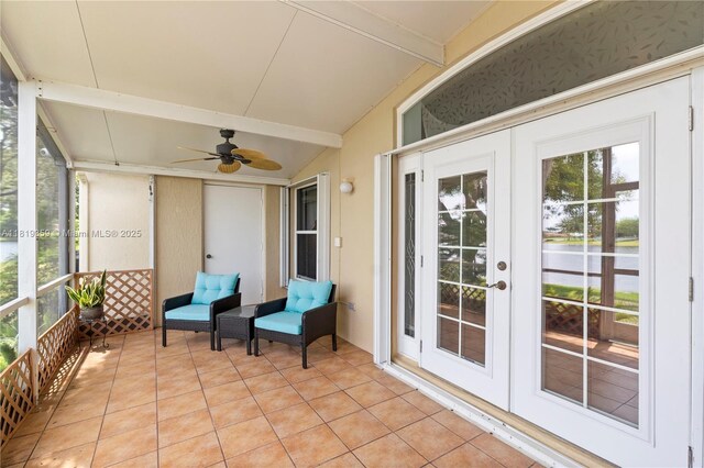 7182 Burgess Dr, Lake Worth, FL 33467 - sunroom with french doors, ceiling fan, and plenty of natural light