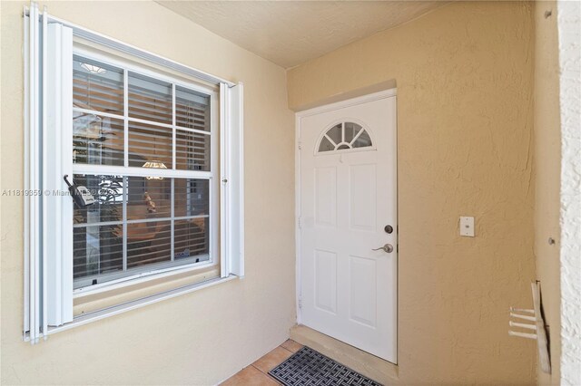 7182 Burgess Dr, Lake Worth, FL 33467 - property entrance featuring stucco siding