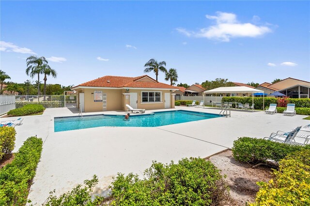 7182 Burgess Dr, Lake Worth, FL 33467 - community pool with a patio