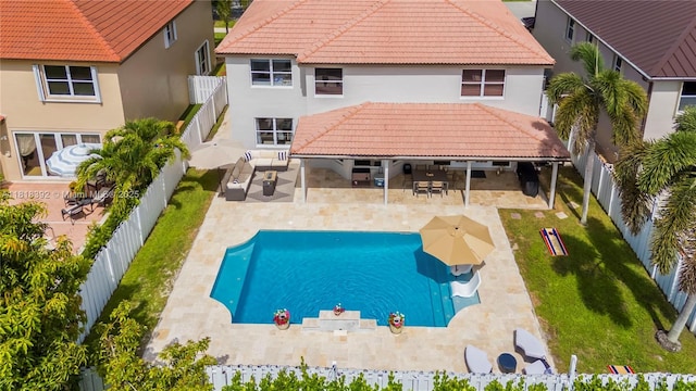 2635 SW 183rd Ave, Miramar, FL 33029 - back of house featuring a tile roof, a fenced backyard, and stucco siding