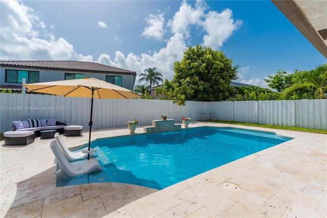 2635 SW 183rd Ave, Miramar, FL 33029 - view of swimming pool with a patio area, a fenced backyard, and an outdoor living space with a fire pit
